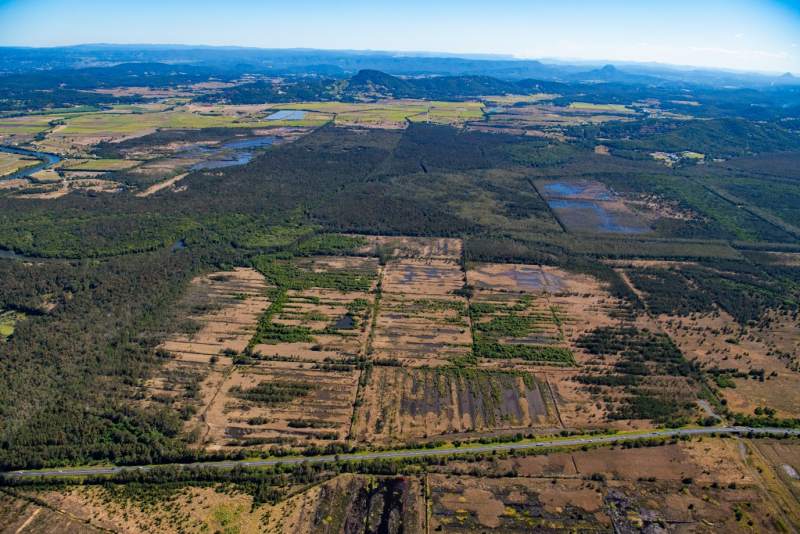 Aerial photograph of the Blue Heart showing mosaic of areas transitioning to wetlands in the foreground and natural wetlands of the floodplain in the background.  